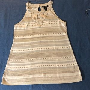 White and black top with gold and silver thread